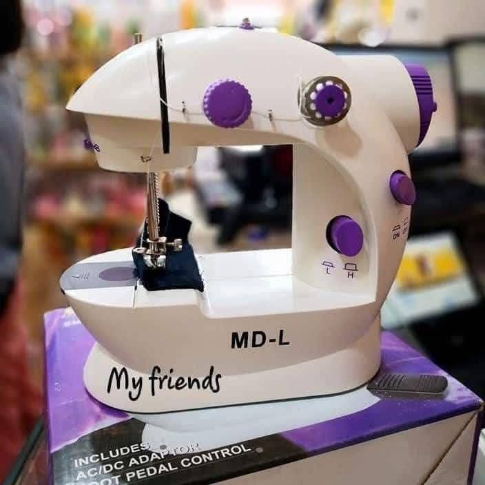 ماكينة خياطة محمولة